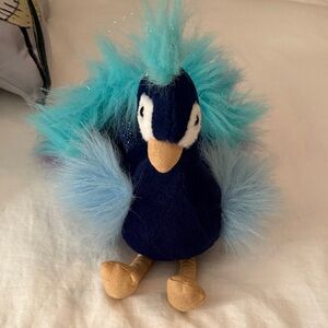 Blue and Tan Stuffed Animal Toy